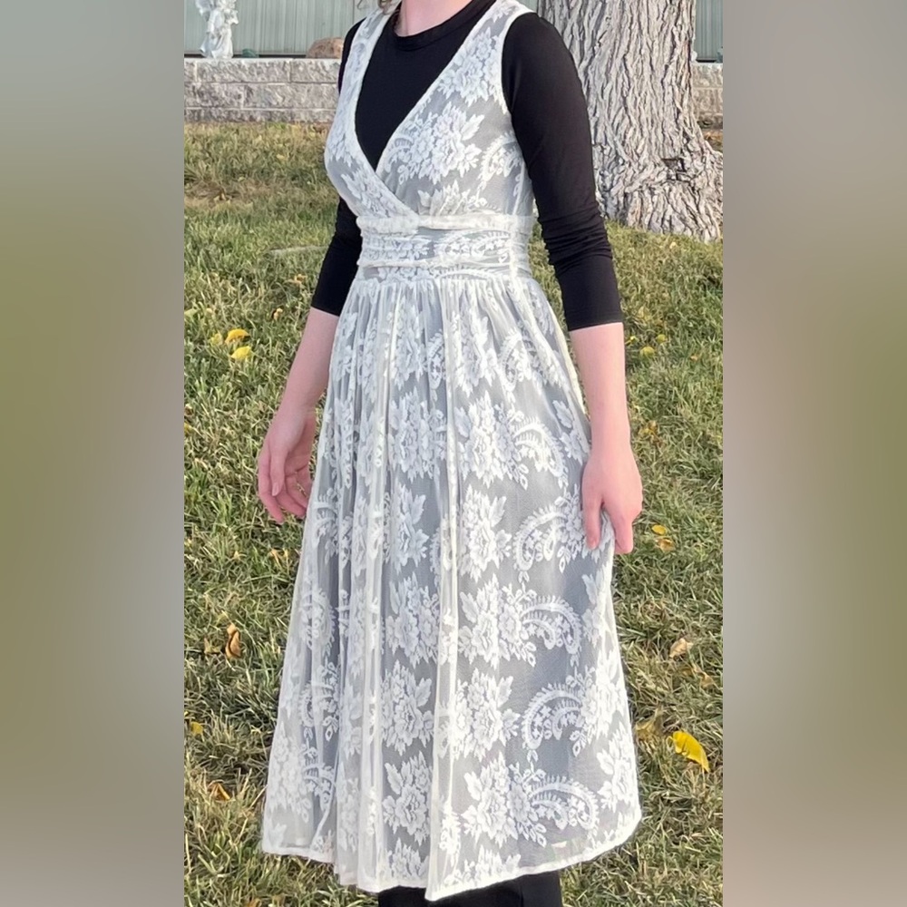 Newport News black and lace dress